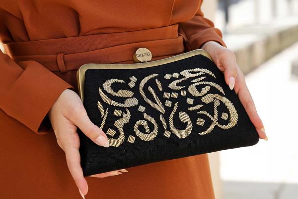 Gold Calligraphy Clutch